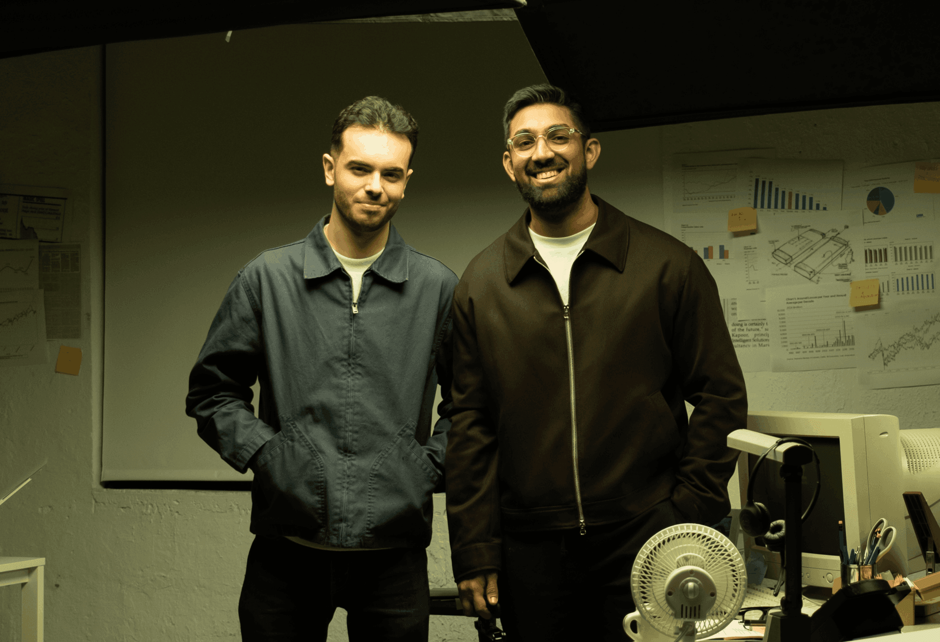 General Magic logo alongside a graphic representing AI agents streamlining insurance processes on mobile devices.