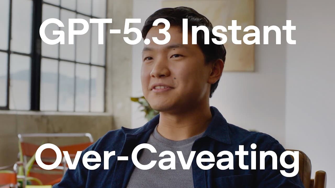 OpenAI researcher Blair sits in a modern office setting, speaking directly to the camera.