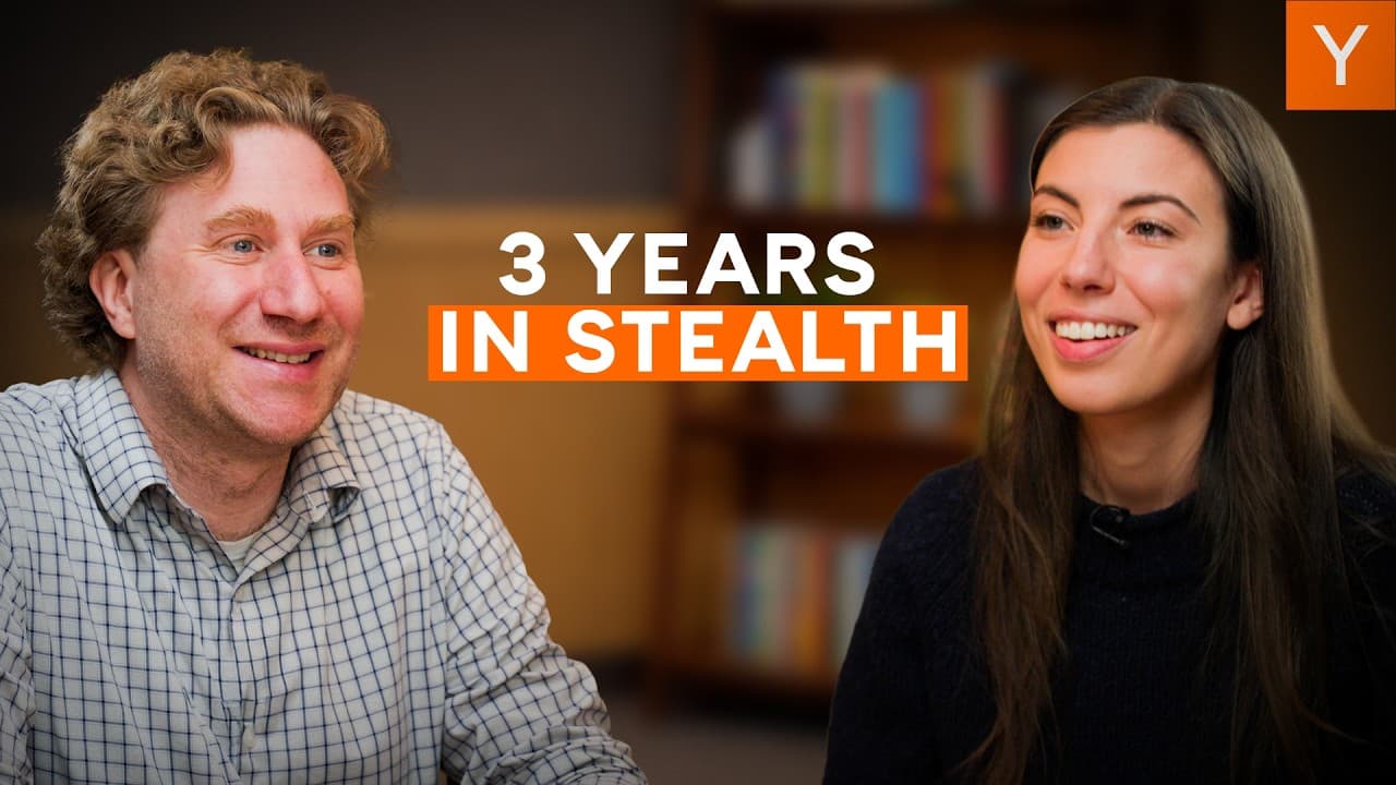 Jared Friedman and Karine Mellata sitting at a table during a Founder Fireside chat.